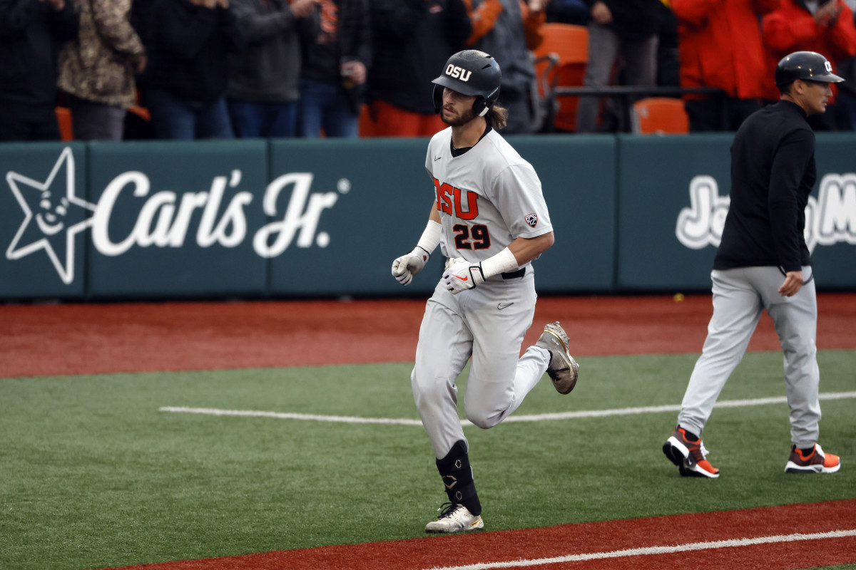 Houston Astros Prospect Jacob Melton round third for OSU.